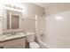 The bathroom features a tub, granite countertops, updated vanity and a large mirror at 6662 Birchwood Ct, Winston, GA 30187