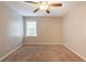 Bedroom featuring carpet, neutral paint and natural light from window at 6662 Birchwood Ct, Winston, GA 30187