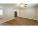 Living room featuring wood floors that transitions to the kitchen at 6662 Birchwood Ct, Winston, GA 30187