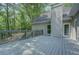 Expansive back deck featuring wood-style flooring and ample space for outdoor seating at 13935 Brown Bridge Rd, Covington, GA 30016
