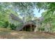Spacious back deck with stairs and railings overlooking the serene backyard at 13935 Brown Bridge Rd, Covington, GA 30016