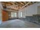 Unfinished basement with concrete floor, exposed ceiling, and cinder block foundation at 13935 Brown Bridge Rd, Covington, GA 30016