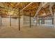 Unfinished basement with exposed utilities and concrete floor ready for customization at 13935 Brown Bridge Rd, Covington, GA 30016