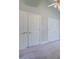 A bedroom features multiple closet doors for plenty of storage space at 13935 Brown Bridge Rd, Covington, GA 30016