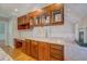 Open concept kitchen has dark cabinets, light counter tops and a large island at 13935 Brown Bridge Rd, Covington, GA 30016