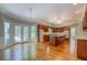 Open floor plan with wooden kitchen and adjacent dining area flooded with natural light at 13935 Brown Bridge Rd, Covington, GA 30016