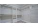 A spacious walk-in closet with ample shelving and storage solutions at 13935 Brown Bridge Rd, Covington, GA 30016
