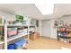 Basement storage area with shelving, storage containers, and good organization at 4025 Demooney Rd, Atlanta, GA 30349