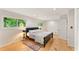 Serene bedroom with hardwood floors, large windows, and calming natural light at 4025 Demooney Rd, Atlanta, GA 30349