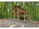 Unique barn structure with covered parking, storage and surrounding wooded area at 4025 Demooney Rd, Atlanta, GA 30349