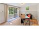 Bright office space with sliding glass doors providing natural light and outdoor access at 4025 Demooney Rd, Atlanta, GA 30349