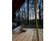 Inside a canvas tent overlooking the forest. See the peaceful forest scene while relaxing on the deck at 4025 Demooney Rd, Atlanta, GA 30349