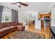 Living space with hardwood floors, open layout including kitchen and dining area at 2465 Main St # 201, Atlanta, GA 30344