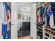 Walk-in closet featuring ample storage space and access to the bathroom at 2465 Main St # 201, Atlanta, GA 30344