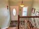 Inviting foyer with a decorative front door, tile flooring, and a staircase leading to the upper level at 403 Hickory Walk, Woodstock, GA 30188