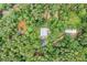 An aerial view of a home and separate structure surrounded by dense, mature trees at 521 East Valley Ne Rd, Rydal, GA 30171