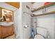 Bathroom with a light wood vanity, and white fixtures, providing a clean and bright space at 521 East Valley Ne Rd, Rydal, GA 30171