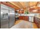 Charming kitchen featuring stainless steel appliances, wood cabinets and granite countertops at 521 East Valley Ne Rd, Rydal, GA 30171