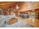 Spacious living area boasts vaulted ceilings, hardwood floors, and an open floor plan at 521 East Valley Ne Rd, Rydal, GA 30171