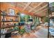 Bright, cheerful office with many windows, desk space, and shelving for storage at 521 East Valley Ne Rd, Rydal, GA 30171