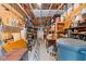 Spacious storage area with wood beams, shelving, and a variety of stored items at 521 East Valley Ne Rd, Rydal, GA 30171