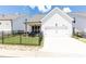 Charming single-Gathering home with two-car garage and backyard seating area at 992 Harvest Park Ln, Suwanee, GA 30024