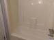 Clean bathroom with tub and shower combination at 2566 Stratford Ln, Morrow, GA 30260