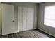 Comfortable bedroom with a closet and a window for natural light at 2566 Stratford Ln, Morrow, GA 30260