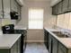 Efficient kitchen with modern appliances and countertops at 2566 Stratford Ln, Morrow, GA 30260