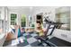 Versatile bonus room filled with light, equipped for play and exercise, offers a flexible space for Gathering activities at 2915 Preakness Nw Dr, Marietta, GA 30064