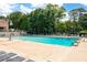 Large community pool with lounge chairs for relaxing and enjoying the outdoors at 2915 Preakness Nw Dr, Marietta, GA 30064