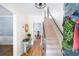 Inviting foyer with hardwood floors and staircase at 2915 Preakness Nw Dr, Marietta, GA 30064