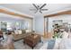 Open floor plan featuring a living room that flows into a kitchen with a large island and stainless steel appliances at 2915 Preakness Nw Dr, Marietta, GA 30064