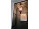 The decorative light casts patterned shadows in this elegantly designed powder room at 327 6Th Ne St, Atlanta, GA 30308