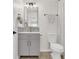 Compact bathroom features modern toilet, elegant fixtures, and neutral color palette at 833 Society Ct, Woodstock, GA 30188