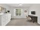 Bright office space with plush carpet, modern decor, and plenty of natural light at 833 Society Ct, Woodstock, GA 30188