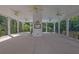 Spacious outdoor community pavilion with seating, fans and views of surrounding greenery at 833 Society Ct, Woodstock, GA 30188