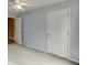 This light blue bedroom has gray carpet, curtains, and white trim at 992 Harbins Pass Dr, Dacula, GA 30019