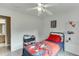 The bedroom offers natural light and hardwood floors, creating a cozy atmosphere at 992 Harbins Pass Dr, Dacula, GA 30019