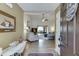 Open-concept living room featuring hardwood floors and neutral paint at 992 Harbins Pass Dr, Dacula, GA 30019