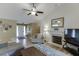 Inviting living room with fireplace, and plenty of natural light at 992 Harbins Pass Dr, Dacula, GA 30019