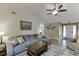 Spacious living room with a fireplace and comfortable seating at 992 Harbins Pass Dr, Dacula, GA 30019