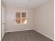A bedroom featuring neutral walls and carpet flooring at 1421 Dennis Dr, Decatur, GA 30032