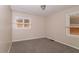 A bedroom featuring neutral walls and carpet flooring at 1421 Dennis Dr, Decatur, GA 30032
