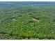 Expansive wooded acreage featuring mature trees and secluded homesites at 5588 Rhododendron Trl, Douglasville, GA 30135