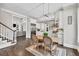 Kitchen and dining area with open layout and stainless steel appliances at 5588 Rhododendron Trl, Douglasville, GA 30135