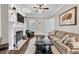 Cozy living room with fireplace, comfortable seating, and natural light creates a relaxing atmosphere at 5588 Rhododendron Trl, Douglasville, GA 30135