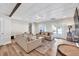 Bright living room with coffered ceilings, hardwood floors, and stylish furnishings at 5588 Rhododendron Trl, Douglasville, GA 30135
