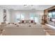 Spacious living room featuring a wood accent wall and stylish decor at 5588 Rhododendron Trl, Douglasville, GA 30135