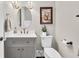 Stylish powder room with elegant vanity, decorative mirror, and tasteful decor at 5588 Rhododendron Trl, Douglasville, GA 30135
